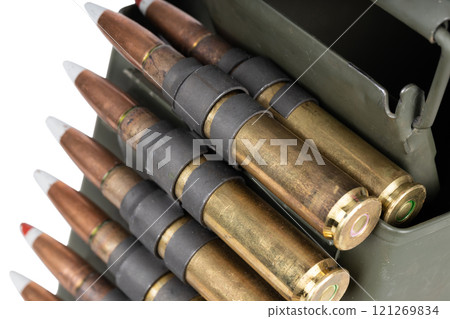 .50 BMG caliber machine gun ammunition belt with cartridges in ammunition can. 121269834