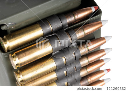 .50 BMG caliber machine gun ammunition belt with cartridges in ammunition can. 121269882