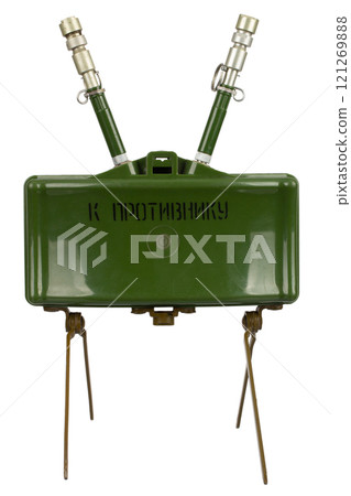 MON-50 soviet copy of American M18 Claymore anti-personnel mine with MUV series fuze. Text on russian - "Toward enemy". MON-50 soviet copy of American M18 Claymore anti-personnel mine with MUV series fuze. Text on russian - "Toward enemy". 121269888