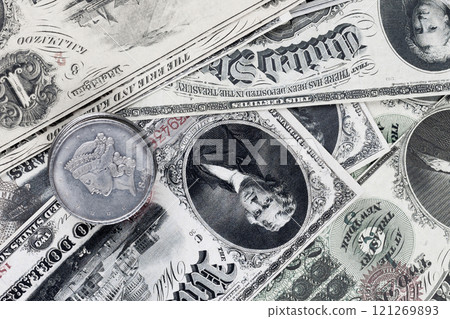 Old west greenback US paper money and silver certificates with silver dollar coins Old west greenback US paper money and silver certificates with silver dollar coins 121269893