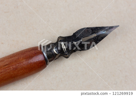 Fountain pen on an antique textured paper. Fountain pen on an antique textured paper. 121269919