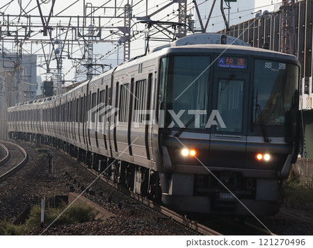 225 series 1000 series rapid train bound for Himeji (W8) passing through Tsukamoto Station 225 series 1000 series rapid train bound for Himeji (W8) passing through Tsukamoto Station 121270496