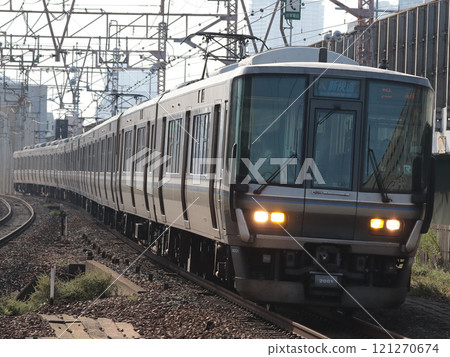 223 series 2000 series special rapid train bound for Himeji (W10) passing through Tsukamoto Station 223 series 2000 series special rapid train bound for Himeji (W10) passing through Tsukamoto Station 121270674