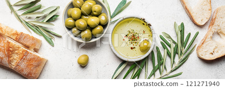 Olive oil with olives and bread 121271940