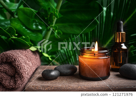 Spa concept with burning candle 121271976