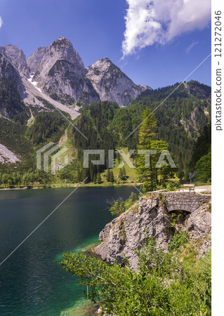 Beautiful nature on the shores of the Vorderer Gosausee lake near Gosau, Austria, sunny summer day Beautiful nature on the shores of the Vorderer Gosausee lake near Gosau, Austria, sunny summer day 121272046
