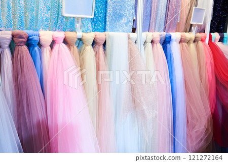 Organza fabrics in textile store 121272164
