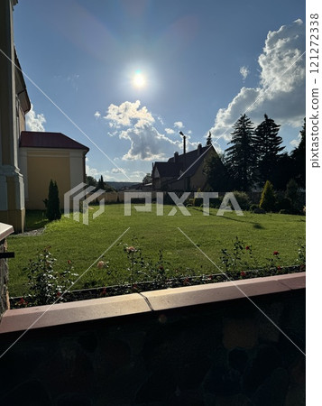 Sunlit Garden with Rustic Charm in the Countryside Sunlit Garden with Rustic Charm in the Countryside 121272338