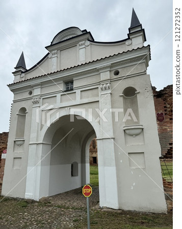 Historic Archway with Cobblestone Path and Stop Sign Historic Archway with Cobblestone Path and Stop Sign 121272352