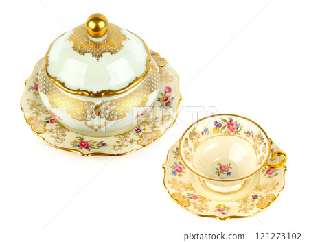 Vintage porcelain candy bowl ,cup and saucer isolated on white. Collage. Free space for text. 121273102