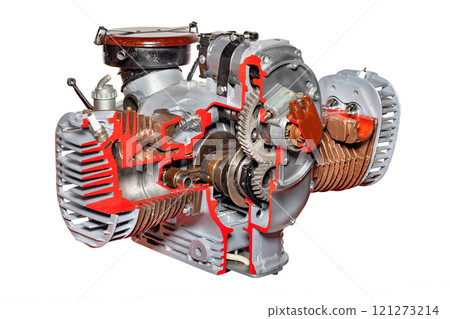 Exploring the intricate design of a classic two-stroke engine in detailed cross-section, isolated on white background. 121273214