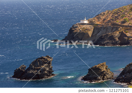 Cala Nans lighthouse on a rocky coastline on a sunny day, Cadaques, Spain Cala Nans lighthouse on a rocky coastline on a sunny day, Cadaques, Spain 121275101