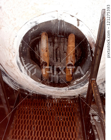 Closed Drum Hatch of an Old Steam Boiler in an Industrial Setting Closed Drum Hatch of an Old Steam Boiler in an Industrial Setting 121275393