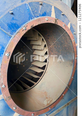 Industrial Exhaust Fan Impeller Inside a Manufacturing Facility Industrial Exhaust Fan Impeller Inside a Manufacturing Facility 121275406