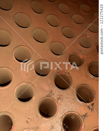 Internal View of a Steam Boiler Drum Featuring Rolled Tubes in a Manufacturing Facility Internal View of a Steam Boiler Drum Featuring Rolled Tubes in a Manufacturing Facility 121275420
