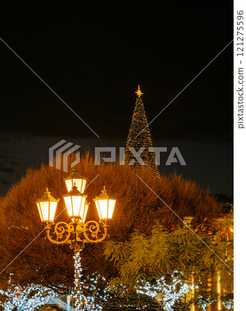 urban lights and top of Christmas tree in Yerevan 121275596