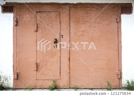 old metal door to the car garage 121275634