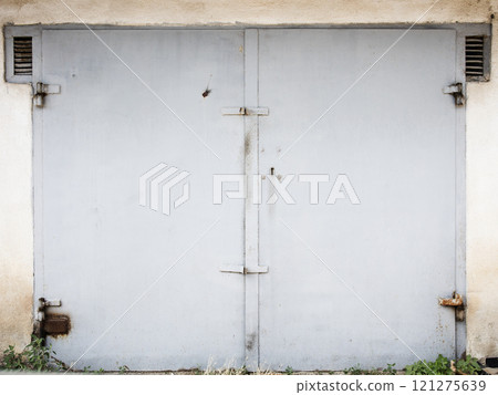 old metal door to the car garage 121275639