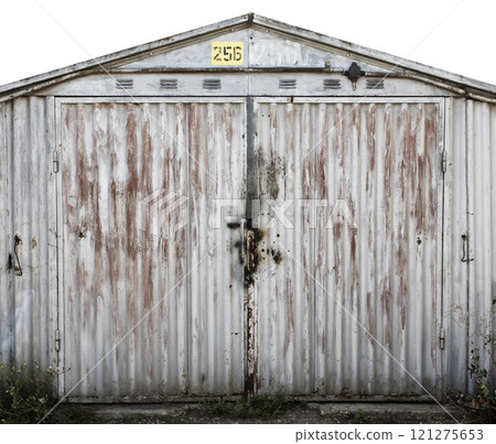 old metal door to the car garage 121275653