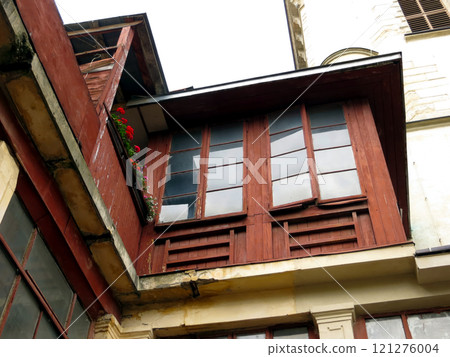 Old Wooden Attic in an Armenian Courtyard in Lviv Showcasing Traditional Architecture and Charm Old Wooden Attic in an Armenian Courtyard in Lviv Showcasing Traditional Architecture and Charm 121276004