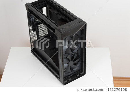 Big tower, empty PC case, chassis, photo of the top of the computer case, without upper and front panel, without tempered-glass left panel, one rear 140 mm and two 200mm front system fans Big tower, empty PC case, chassis, photo of the top of the computer case, without upper and front panel, without tempered-glass left panel, one rear 140 mm and two 200mm front system fans 121276108
