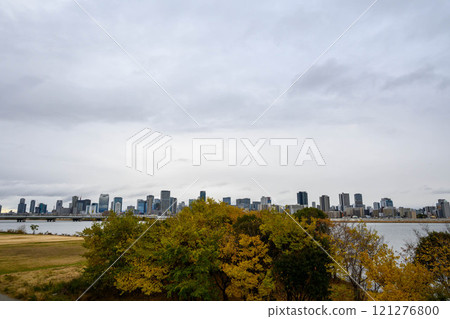 View of the Umeda skyscrapers on the opposite bank from the Yodo River in Osaka 121276800