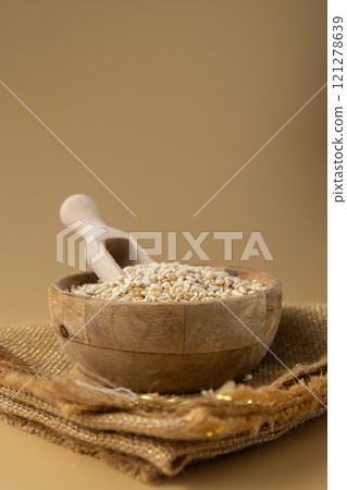 Raw pearl barley porridge Gluten free cereals. Health gut benefits. Concept of alternative whole spelt grain ingredient. Vegetarian diet recipes. Plant-based lifestyle. Copy space Protein rich 121278639