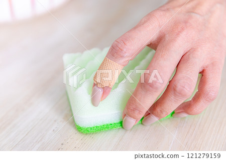 Hands chapped from cleaning 121279159