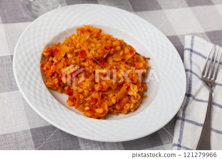 Braised cabbage with pearl barley served on plate Braised cabbage with pearl barley served on plate 121279966