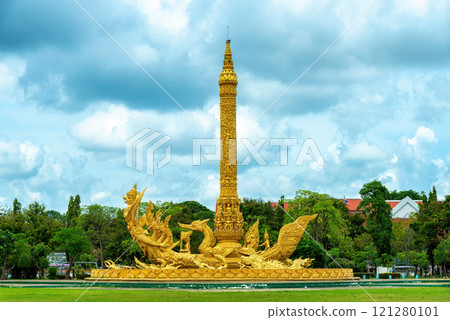 Golden Giant Buddhist Lent Candle Monument with Garuda figure at Thung Si Muang Public Park, Ubon Ratchathani, Thailand. 121280101