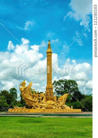 Golden Giant Buddhist Lent Candle Monument with Garuda figure at Thung Si Muang Public Park, Ubon Ratchathani, Thailand. 121280103