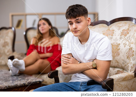Portrait of a young couple offended by each other after a quarrel Portrait of a young couple offended by each other after a quarrel 121280203