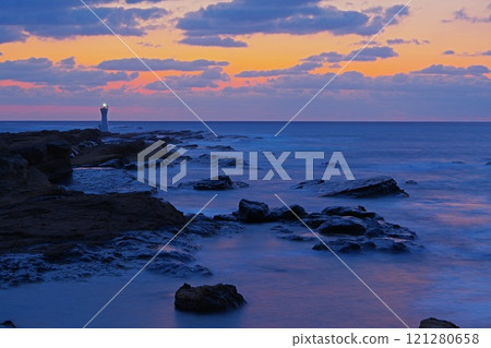 Ver1 of a small lighthouse standing on the rough sea in Chikura Town, Minamiboso, with the morning sky in the background Ver1 of a small lighthouse standing on the rough sea in Chikura Town, Minamiboso, with the morning sky in the background 121280658