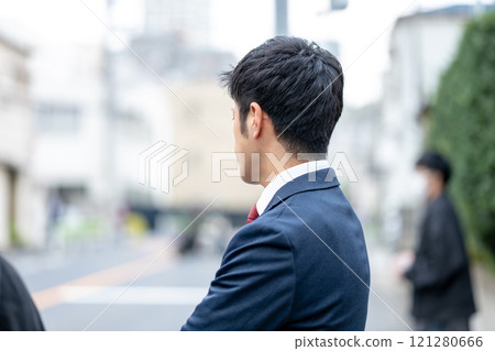 A man in a suit 121280666
