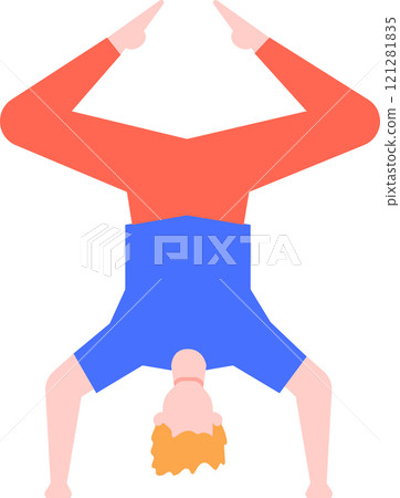 Young man practicing yoga performing a headstand pose balancing on his hands with legs raised up, promoting health and wellness through physical activity 121281835