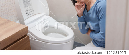 Middle-aged woman suffering from toilet trouble 121281925