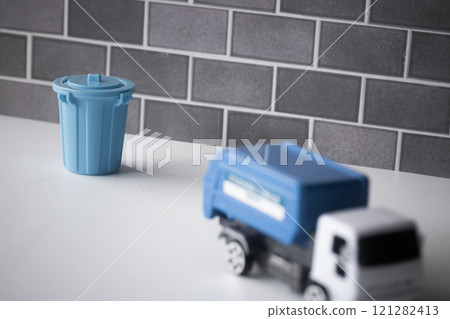 The garbage truck has gone 121282413