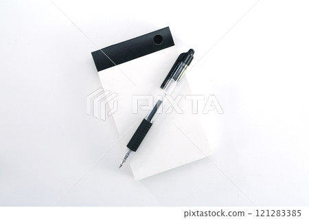 Ballpoint pen and notepad Ballpoint pen and notepad 121283385