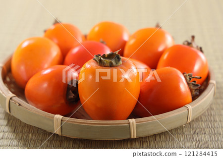 Delicious looking persimmon Delicious looking persimmon 121284415