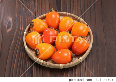 Delicious looking persimmon Delicious looking persimmon 121284593
