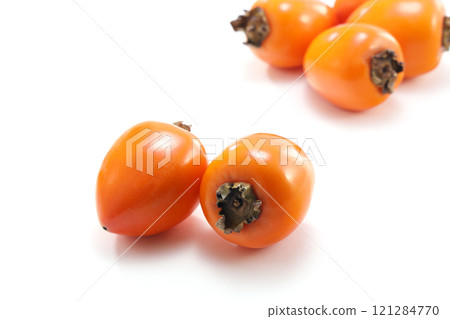 Delicious looking persimmon 121284770
