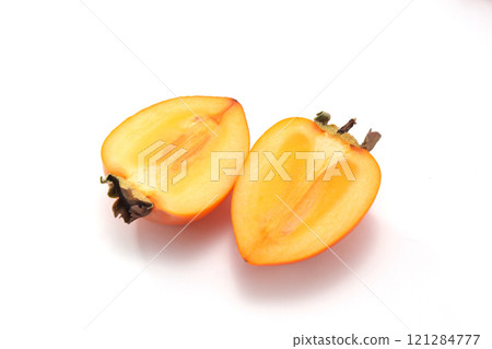 Delicious looking persimmon 121284777
