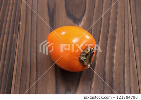 Delicious looking persimmon Delicious looking persimmon 121284796