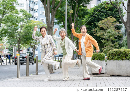 Senior women friends smiling Senior women friends smiling 121287317