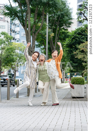 Senior women friends smiling 121287323