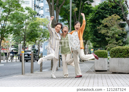 Senior women friends smiling 121287324