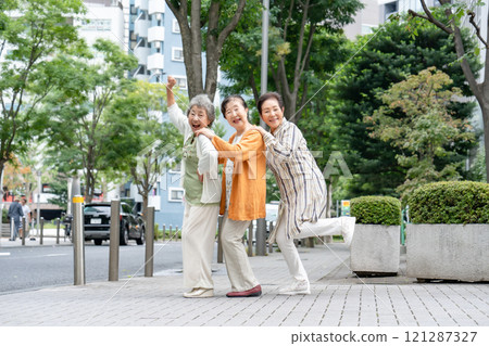 Senior women friends smiling 121287327
