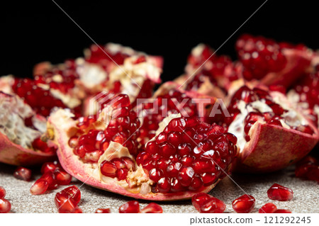 Close-up of pomegranate seeds, an open fruit, the benefits of pomegranates. Close-up of pomegranate seeds, an open fruit, the benefits of pomegranates. 121292245