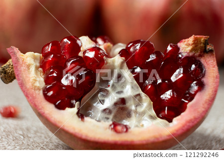 Close-up of pomegranate seeds, an open fruit, the benefits of pomegranates. Close-up of pomegranate seeds, an open fruit, the benefits of pomegranates. 121292246
