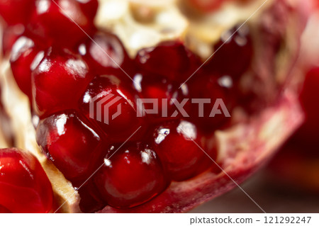 Pomegranate seeds in pomegranate, macro. Pomegranate seeds in pomegranate, macro. 121292247